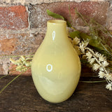 Small Yellow Glass Bottle