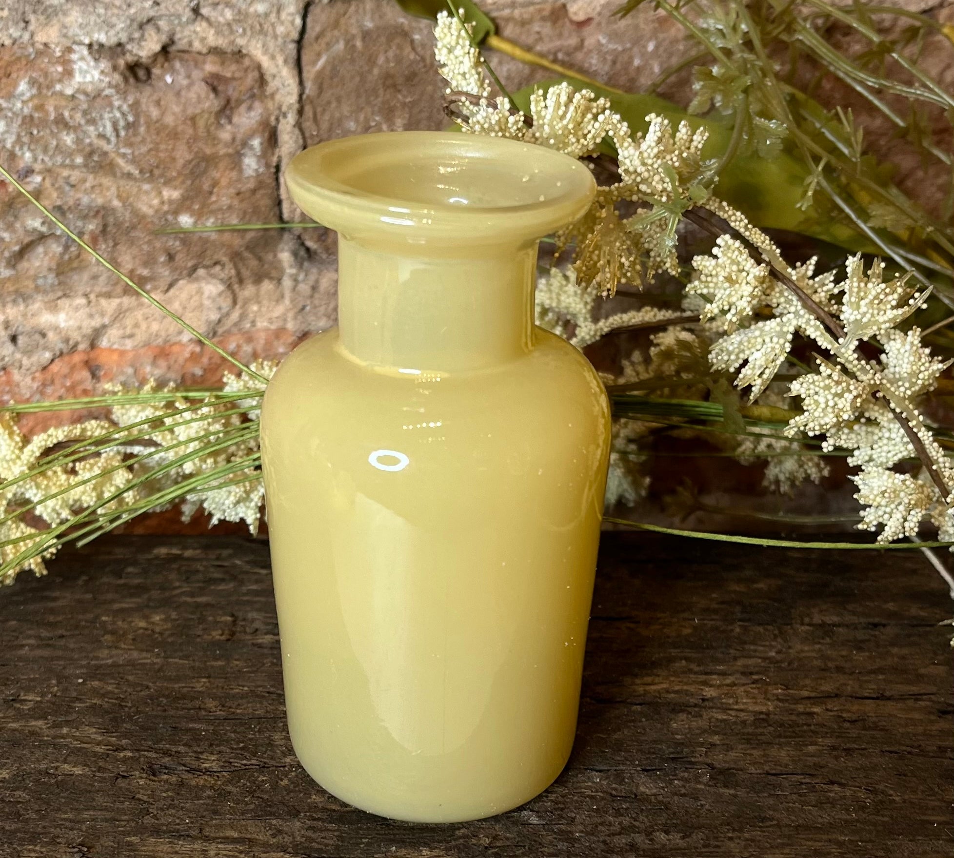 Small Yellow Glass Bottle