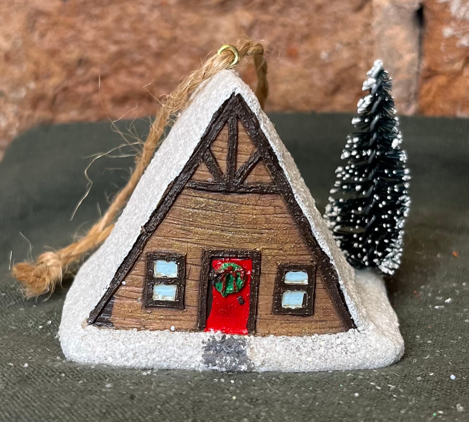 Resin House w/ Snow & Tree Orn 2.5”