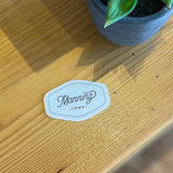 Manning Script Sticker