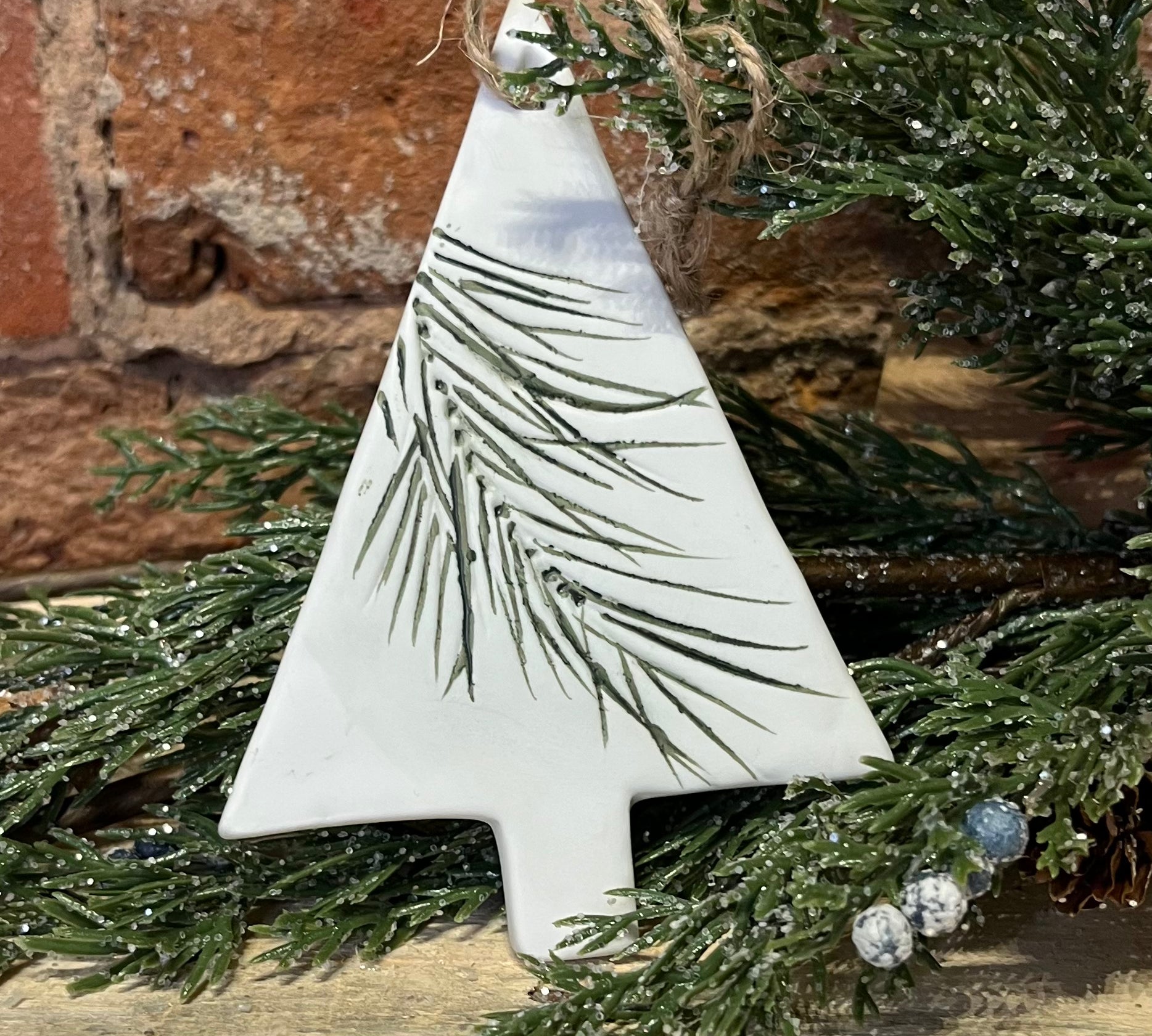 White Ceramic w/Stamped Green Pine Icon Orn 4"