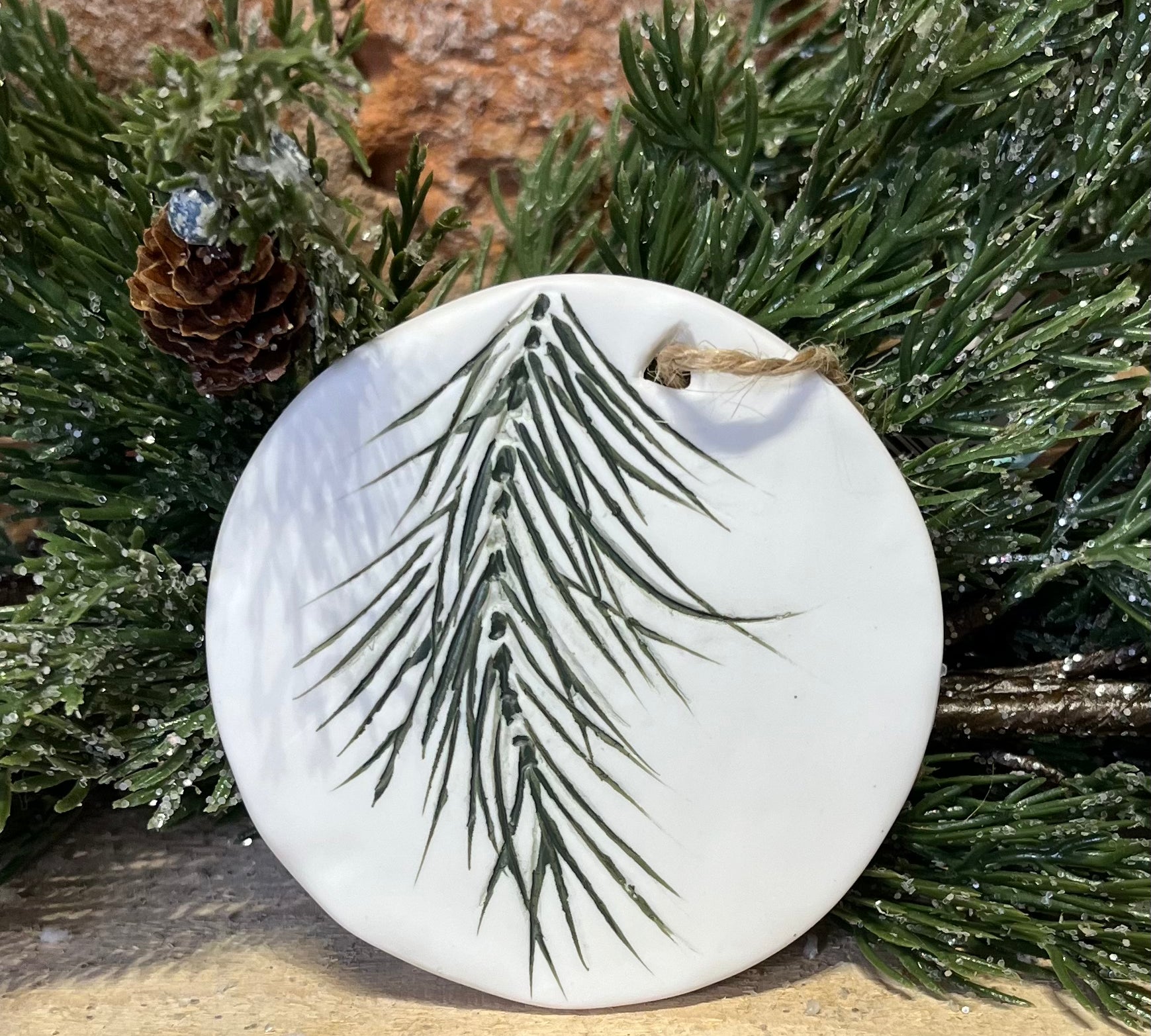 White Ceramic w/Stamped Green Pine Icon Orn 4"